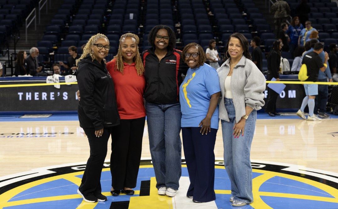 Chicago Urban League Youth and Family Services team on the Chicago Sky court